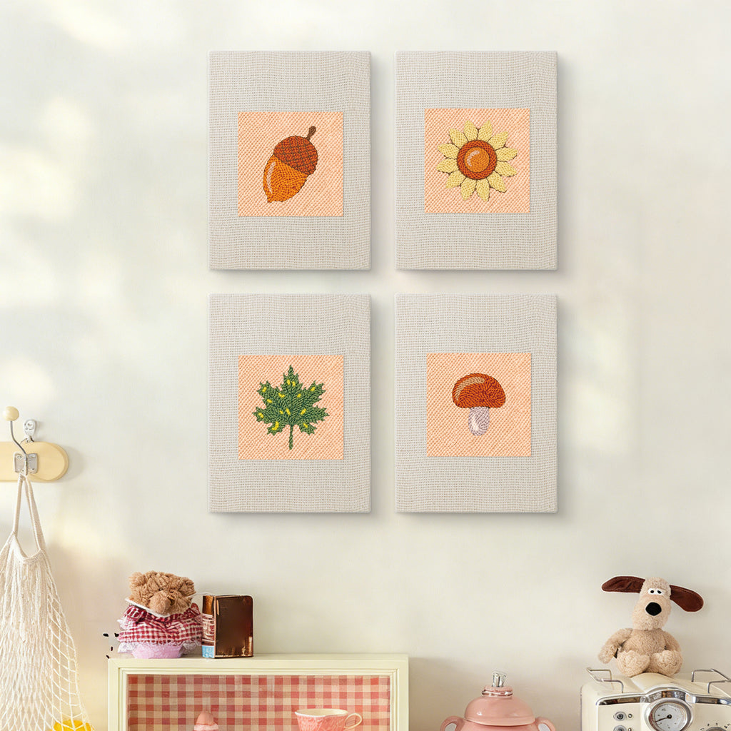 The four Acorn and Mushroom mini canvases on a wall above a shelf