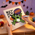 Punching the Ahhh Frog design with the punch needle