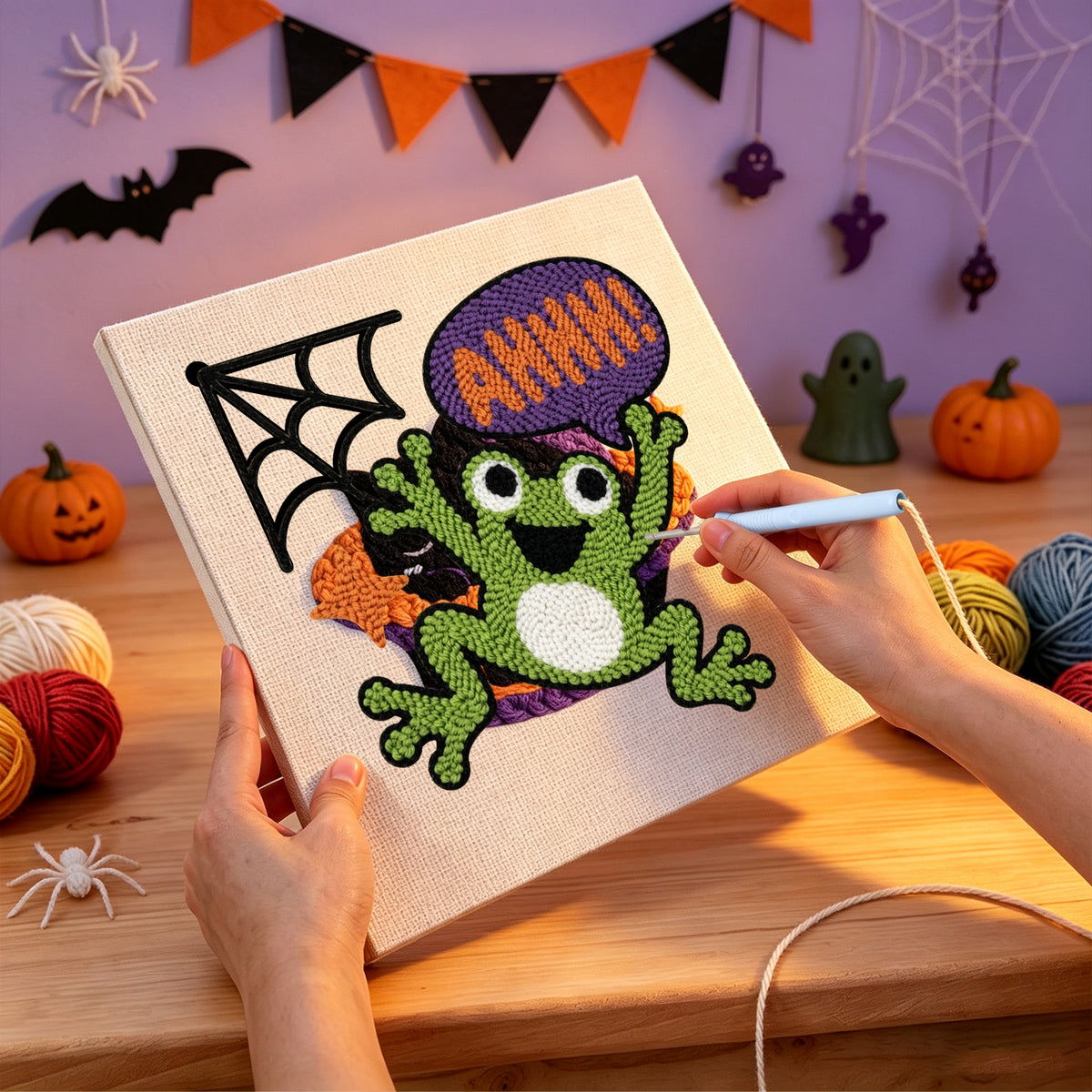 Punching the Ahhh Frog design with the punch needle