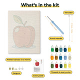 What is in the Apple on Blue kit: printed canvas, punch needle, threader, threads, color guide and hangers