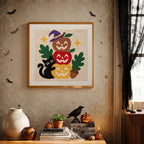 Finished Apple Pumpkin Stack punch needle canvas on a wall
