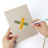 Punching a Art Class Palette mini canvas with the punch needle