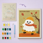 Autumn Ride Ghost canvas before and after punching, with the threads and tools