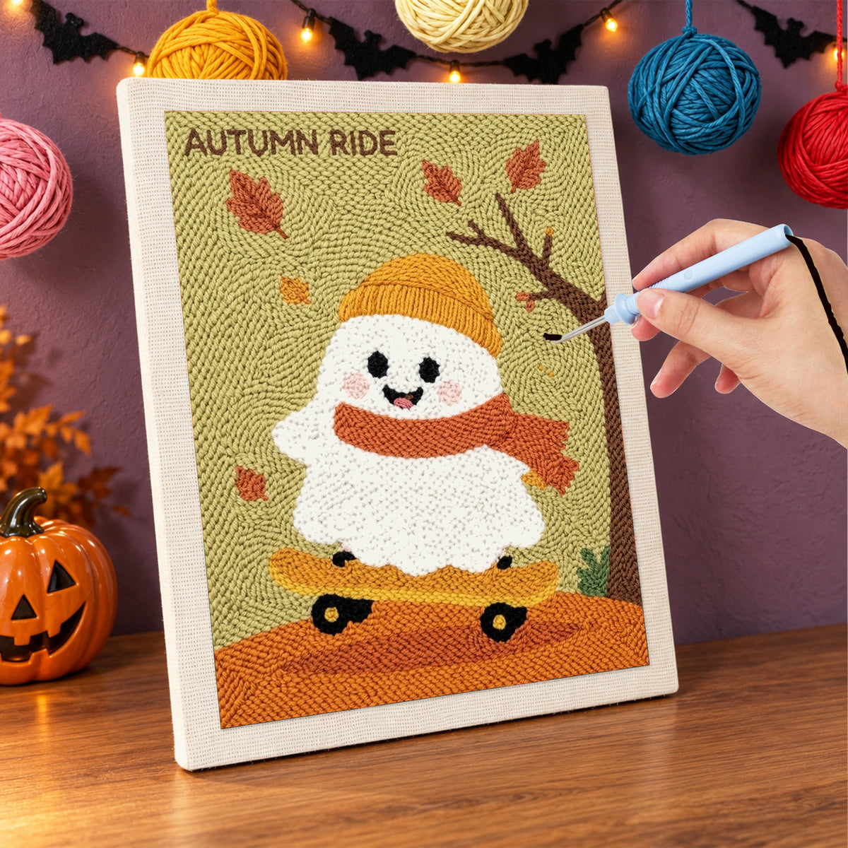 Punching the Autumn Ride Ghost design with the punch needle