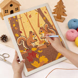 Punching the Autumn Squirrels design with the punch needle
