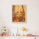 Finished Autumn Squirrels punch needle canvas on a wall