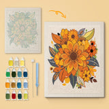 Autumn Sunflowers canvas before and after punching, with the threads and tools