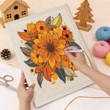 Punching the Autumn Sunflowers design with the punch needle