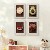 The four Avocado Watermelon mini canvases on a wall above a shelf