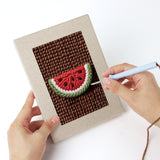 Punching a Avocado Watermelon mini canvas with the punch needle