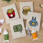 The four finished Backyard Burger Cook mini canvases laid out on a table