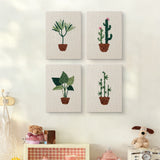 The four Bamboo Palm Pots mini canvases on a wall above a shelf