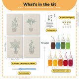 What is in the Bamboo Palm Pots set: 4 printed canvases, punch needle, threader, threads, color guide and 4 sets of hangers (6 × 8 in (15 × 20 cm) each)