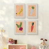 The four Banana and Radish mini canvases on a wall above a shelf