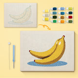 Banana Bunch canvas before and after punching, with the threads and tools