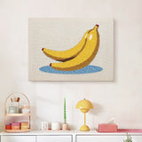 Finished Banana Bunch punch needle canvas on a wall