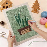 Punching the Basket Snake Plant design with the punch needle