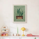Finished Basket Snake Plant punch needle canvas on a wall