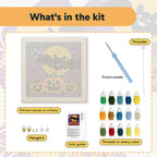 What is in the Bat and Three Pumpkins kit: printed canvas, punch needle, threader, threads, color guide and hangers