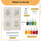 What is in the Bauble and Snowflake set: 4 printed canvases, punch needle, threader, threads, color guide and 4 sets of hangers (6 × 8 in (15 × 20 cm) each)