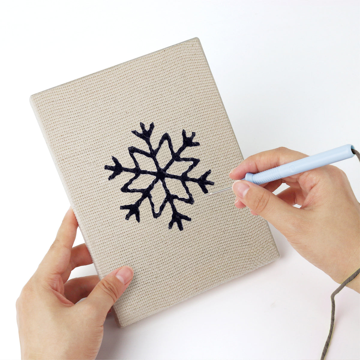 Punching a Bauble and Snowflake mini canvas with the punch needle