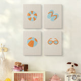 The four Beach Day Essentials mini canvases on a wall above a shelf