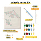 What is in the Beach Umbrella Day kit: printed canvas, punch needle, threader, threads, color guide and hangers
