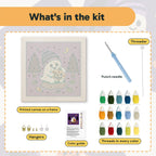 What is in the Beanie Ghost kit: printed canvas, punch needle, threader, threads, color guide and hangers