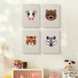 The four Bear and Tiger mini canvases on a wall above a shelf