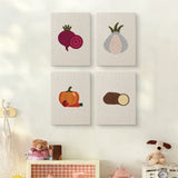 The four Beet and Garlic mini canvases on a wall above a shelf