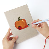 Punching a Beet and Garlic mini canvas with the punch needle