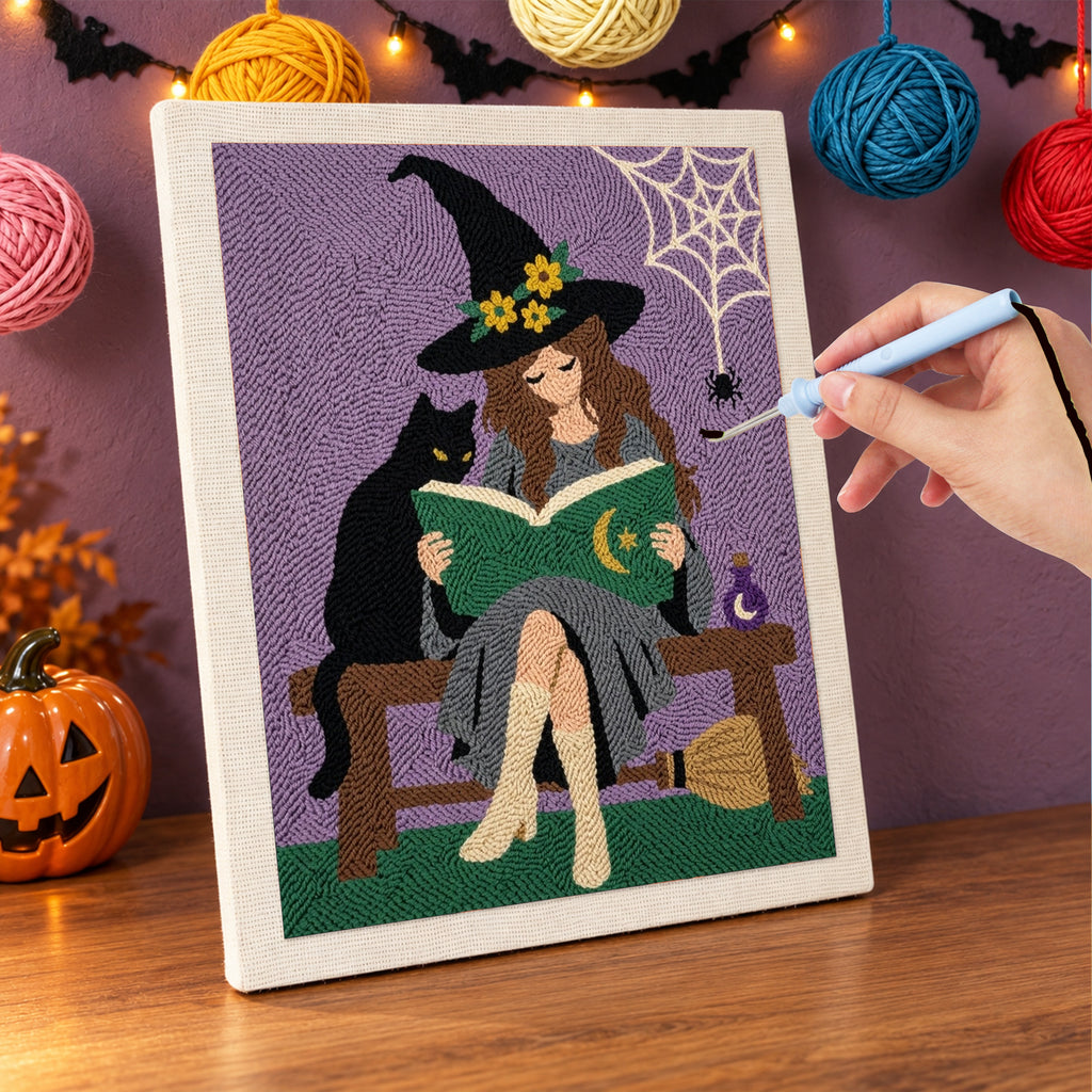 Punching the Bench Witch and Cat design with the punch needle