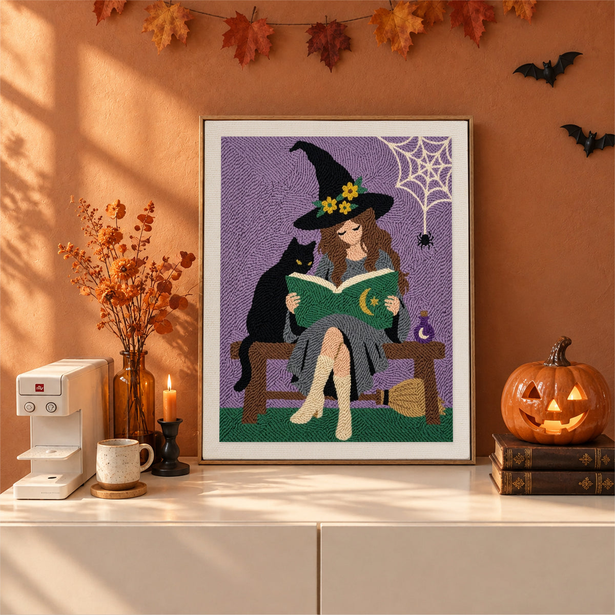 Finished Bench Witch and Cat punch needle canvas on a wall