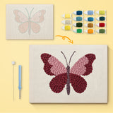 Berry Butterfly canvas before and after punching, with the threads and tools