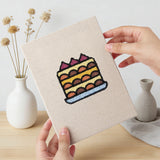 Hand holding a finished Berry Roll Cake mini canvas