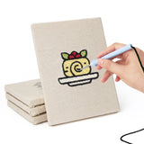 Hand punching one of the Berry Roll Cake mini canvases