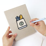 Punching a Berry Roll Cake mini canvas with the punch needle