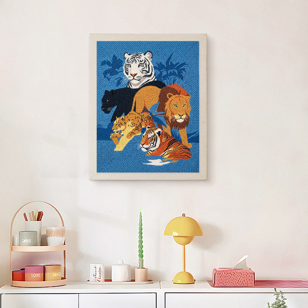 Finished Big Cats Gathering punch needle canvas on a wall