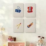 The four Binder Clip Tools mini canvases on a wall above a shelf