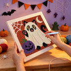 Punching the Black Cat Ghost design with the punch needle