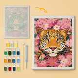 Blossom Leopard canvas before and after punching, with the threads and tools