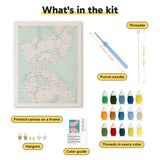 What is in the Blossom Reflection kit: printed canvas, punch needle, threader, threads, color guide and hangers