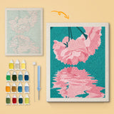 Blossom Reflection canvas before and after punching, with the threads and tools