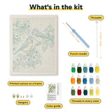 What is in the Blossom Songbirds kit: printed canvas, punch needle, threader, threads, color guide and hangers