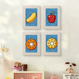 The four Blue Donut Duo mini canvases on a wall above a shelf