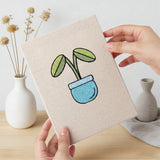 Hand holding a finished Blue Planter Blooms mini canvas