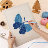 Punching the Blue Shades Butterfly design with the punch needle