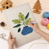 Punching the Blue Vase Leaves design with the punch needle