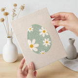 Hand holding a finished Blush Easter Eggs mini canvas