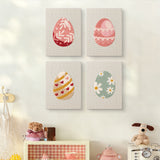 The four Blush Easter Eggs mini canvases on a wall above a shelf